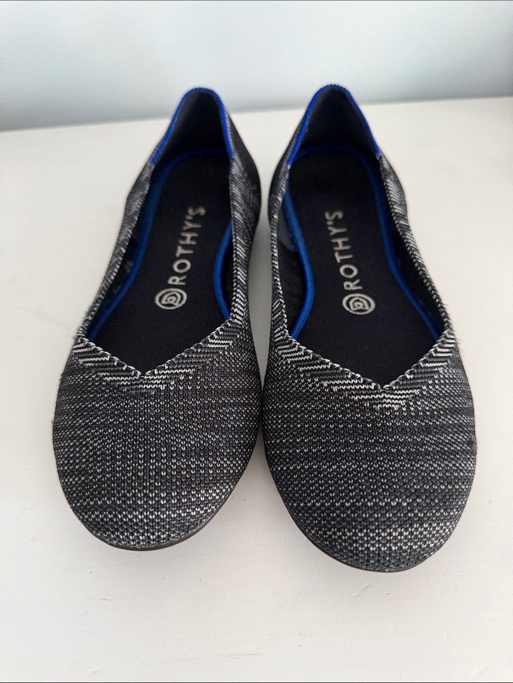 Rothy's Women's Black & White Knit Ballet Flat with Blue Trim